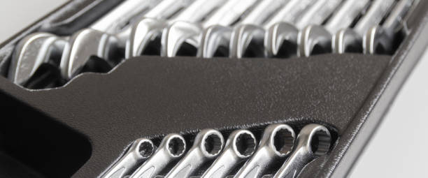 istock Spanners. Many wrenches inside boxtool. Grey background. Set of wrenches in different sizes on grey background. 1398597909