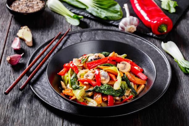 istock Stir Fry Vegetables in black bowl, top view 1398597942