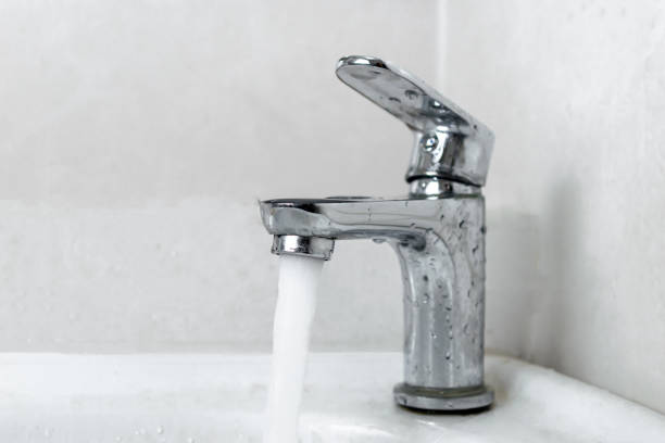 istock faucet dripping water 