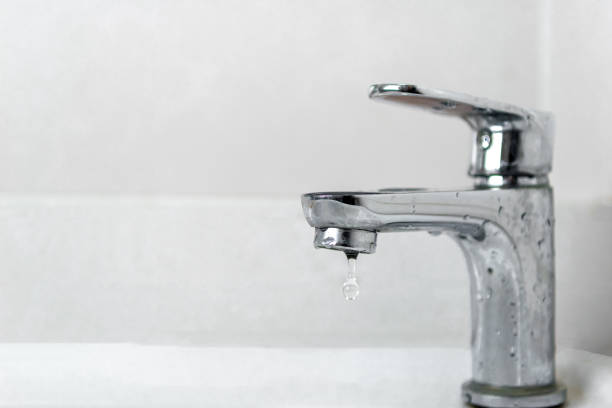 istock faucet dripping water 