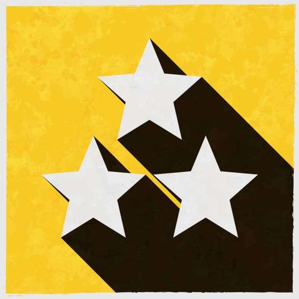 три звезды. иконка с длинной тенью на текстурированном желтом фоне - rating star shape ratings ranking stock illustrations