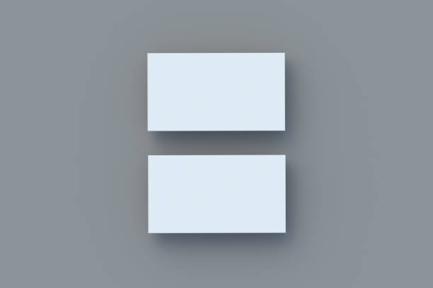 istock Two stack of white business cards on gray background. Top view. 3d render 1398600661