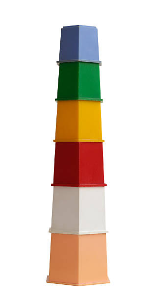 spielzeug blöcke isoliert - cup child geometric shape stacking stock-fotos und bilder