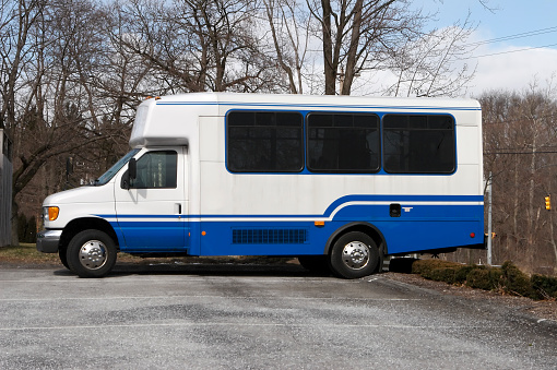 Blue & White Shuttle Bus