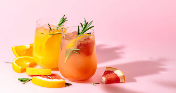 istock Summer cocktails with grapefruit, orange, rosemary, and ice. 1398602321