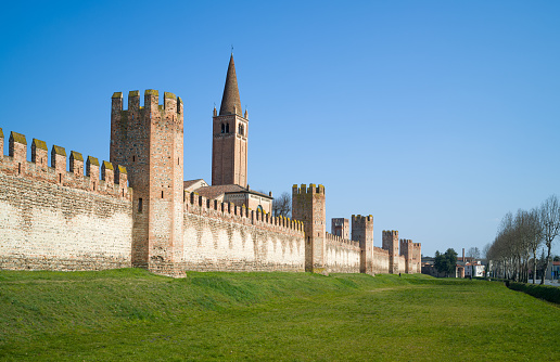 Italy, Montagnana,the medieval walls that surround the town with the bell tower of the San Francesco church
