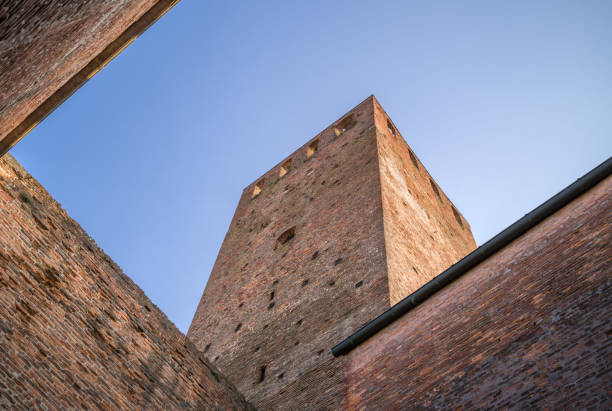 Montagnana, Italy - March 4, 2022: Upward view of the St.Zeno castle with the Ezzelino tower, part of the medieval walls that surround the town