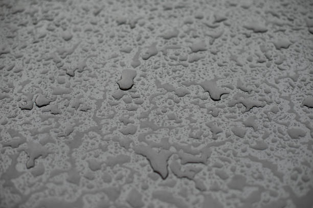 istock Raindrops on surface. Details of rain. Wet glass. 1398606696