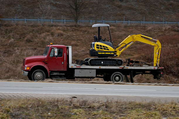 istock Truck Hauling Backhoe 139861099