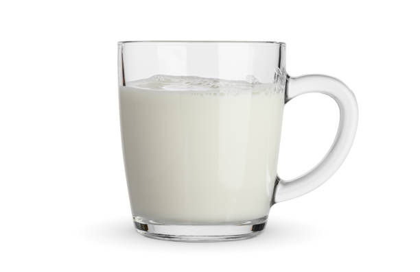 istock Glass of milk isolated on white 1398613202