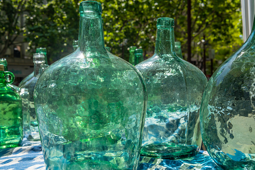 Old empty glass bottles left out in the open