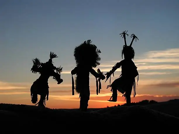 native american dancers at sunset