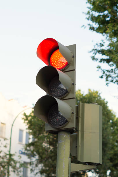 istock Red traffic light. Traffic light with red LED lights on. Traffic light on to regulate the traffic in the city. 1398617090