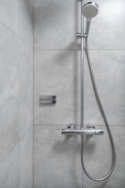 istock Contemporary shower zone with rain head in bathroom 1398617478