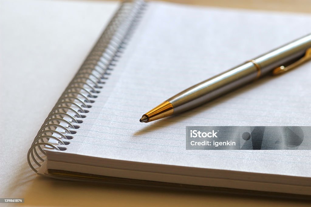 Notebook and Pen Open Notebook and Pen. Shallow Depth of Field Accessibility Stock Photo