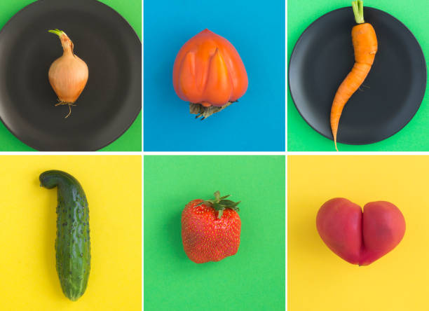 istock Collage of ugly fruit and vegetable on the colored  background. Top view. 1398619616