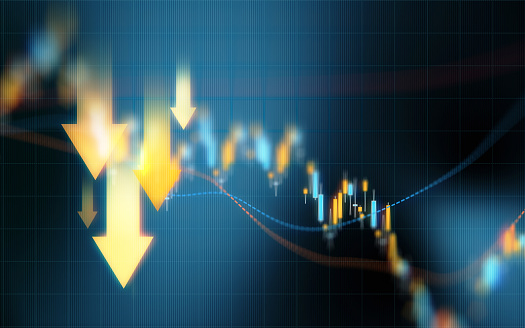 Concepto de inversión y finanzas: flechas amarillas hacia abajo sobre el fondo del gráfico financiero azul photo