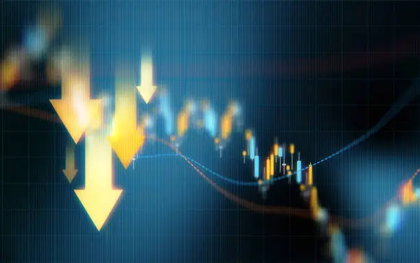 Down arrows over blue financial graph background. Horizontal composition with selective focus and copy space. Investment, stock market data and finance concept.