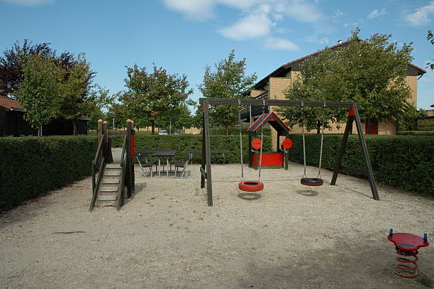 Typical Danish suburban playground Suburban playground i a residential area in the suburbs of Copenhagen, Denmark. alintal stock pictures, royalty-free photos & images