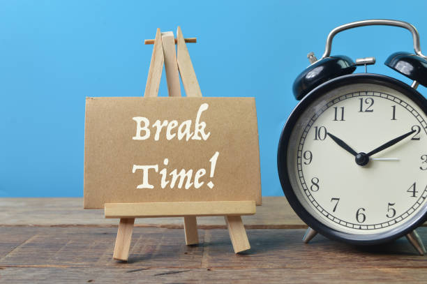 istock Alarm clock and brown card written with BREAK TIME! 1398621478