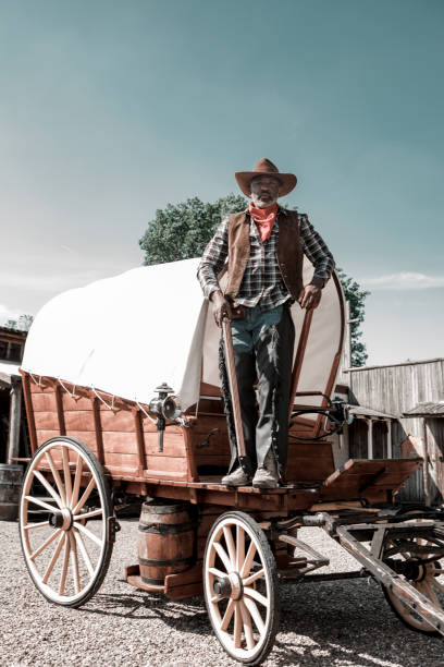 istock Handsome Black Cowboy in an authentic wild west setting 1398621709