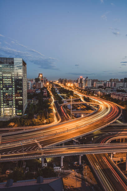istock Urban highway traffic at night 1398621746