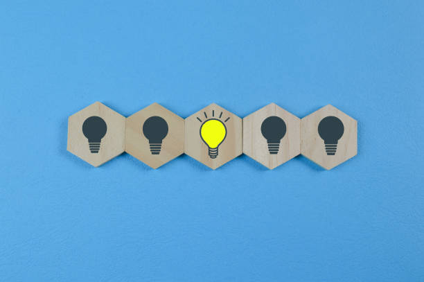 istock Wooden cube block with light bulb symbol 1398623026