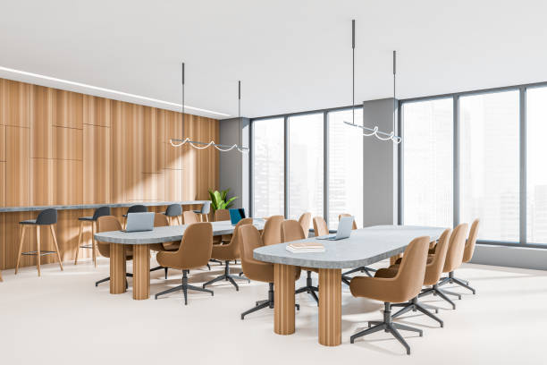 istock Corner view on dark office room interior with panoramic windows 1398624371