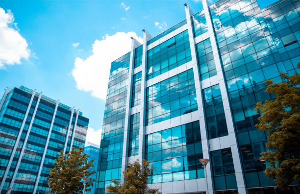 Glass Window building of new office space Glass business office buildings architecture in modern city. Urban corporate skyscraper exterior and skyline. Copy space building exterior stock pictures, royalty-free photos & images