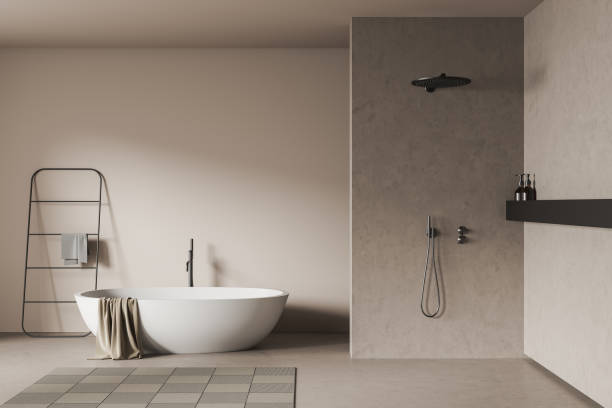 istock Light bathroom interior with tub, douche and rail ladder 1398626069