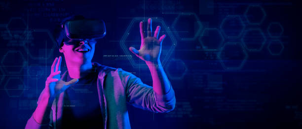 istock Asian man playing VR virtual reality exercise game sport game metaverse digital world technology AR augmented reality future fun party activity 1398627329