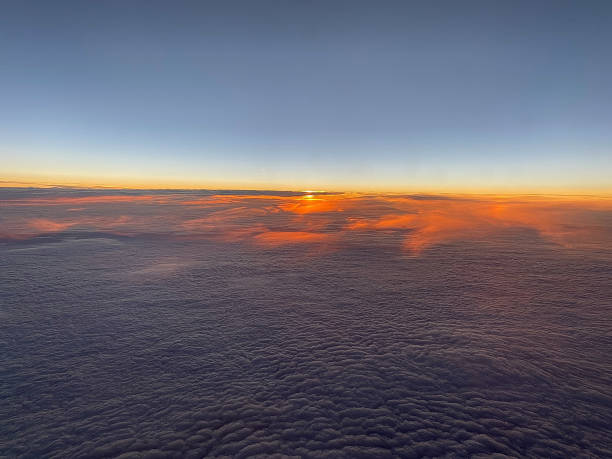istock Sunset above the clouds up in the air 1398627938