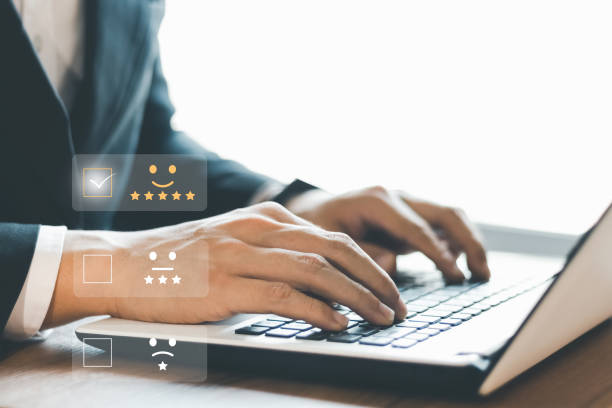 istock User give rating to service experience on online application, Customer review satisfaction feedback survey concept,  Customer can evaluate quality of service leading to reputation ranking of business. 1398629280