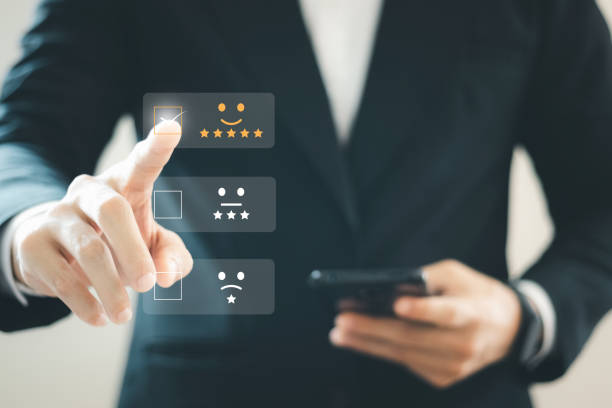 User give rating to service experience on online application, Customer review satisfaction feedback survey concept,  Customer can evaluate quality of service leading to reputation ranking of business.
