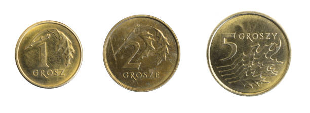 istock Polish gold and penny coins on a white isolated background 1398630345