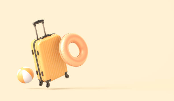 istock Suitcase with beach ball and swimming float 1398633994