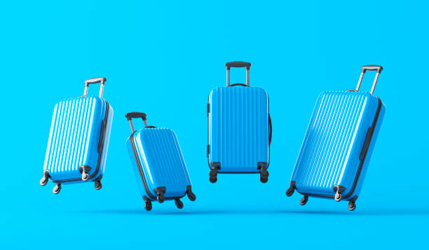 Flying suitcases stock photo