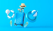 Blue Suitcase and Beach Accessories