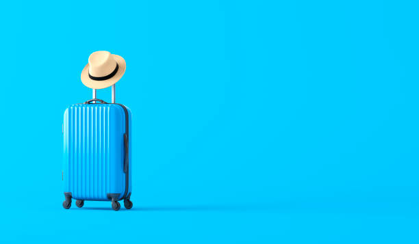 Suitcase and hat on a blue background. 3d illustration