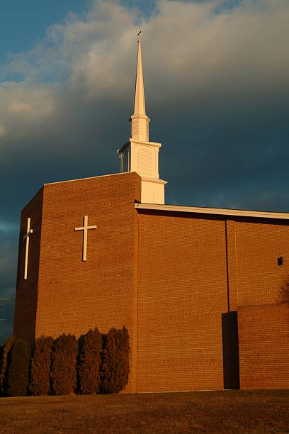 istock Brick Church with Steeple at Sunset 139863477