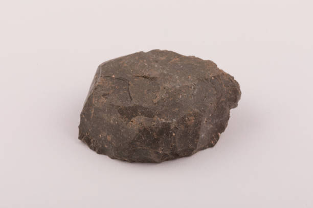 istock A rock sample of Obsidian a volcanic glass rock extruded from a volcano 1398637320