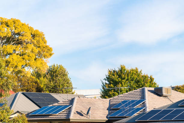istock House roofs with solar panels on a day 1398637890