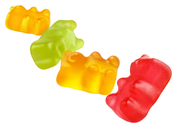 istock Tasty gummy jelly bears on white 1398639410