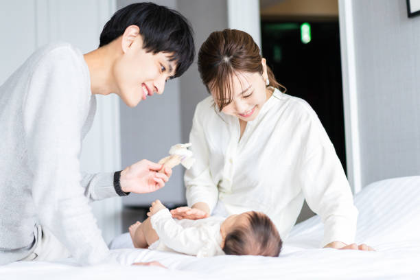 istock A young couple nursing their baby 1398640335