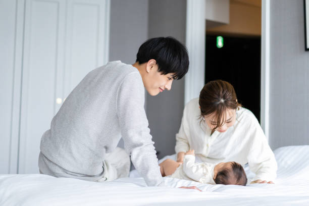 istock A young couple nursing their baby 1398640354