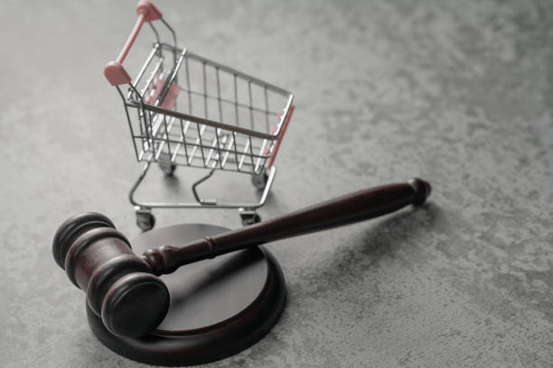 istock Shopping cart and mallet 1398640505