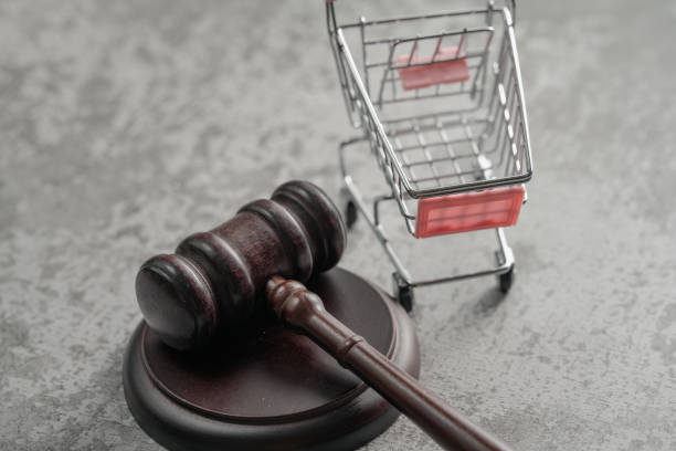 istock Shopping cart and mallet 1398640808