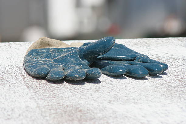 blue work gloves stock photo