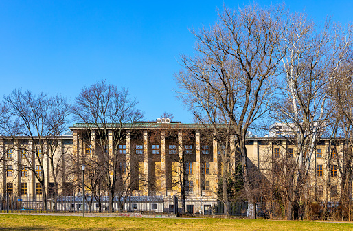 Warsaw, Poland - March 25, 2022: National Museum Muzeum Narodowe main complex south facade seen from Na Ksiazecem Park in Srodmiescie downtown district