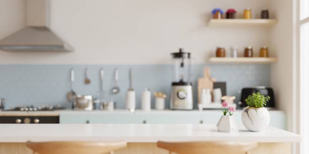 istock Wood table top on blur kitchen room background,Modern Contemporary kitchen room interior. 1398645129